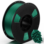 3D printing PLA metal filament spool with green teal metallic filament and coiled sample