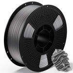 3D printing PLA metal filament spool with silver metallic filament and coiled sample strand